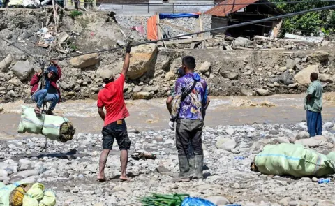 Sudden Floods Killed many People In  Indonesia 
