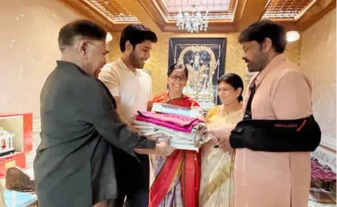 Allu Sirish gives Invitation Card to Chiranjeevi, Surekha