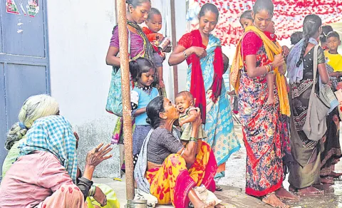 grandmother comforts crying child shivaratri begging scene peddapalli temple
