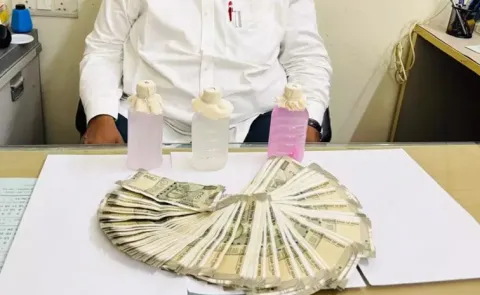 Ghmc Official From Kukatpally Caught Taking Rs 15 Lakh Bribe