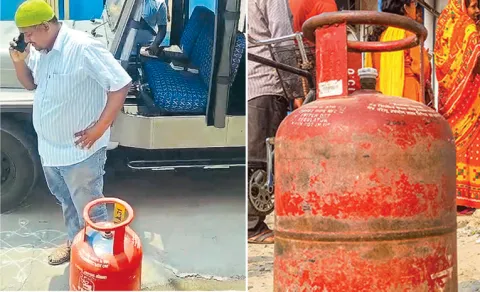Municipal Staff Seize Gas Cylinder Over Unpaid House Tax Warangal