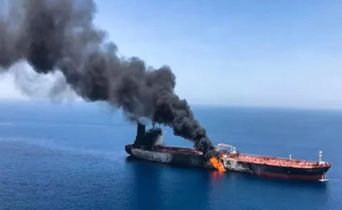 Oil tanker attacked in Strait of Hormuz as Iran strikes Oman port