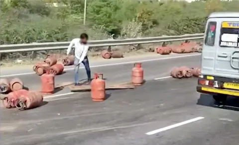 Overturned cylinder lorry  Gas cylinders