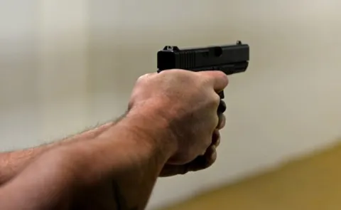 Unknown Person Gun Fire At Vijayawada