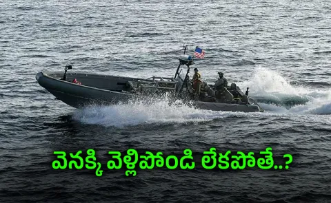 US helicopter gunner warns ship near iran port