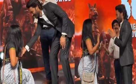 Female Fan Going Down On Her Knees In Front Of Dhanush At Kara Prerelease Event