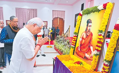 Tamil Saint poet Thiruvalluvar in saffron robes at Lok Bhavan