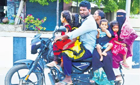 seven people travel on single bike in anantapur