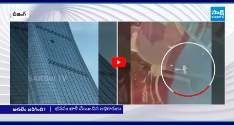 Small Aircraft Crashes Into Beijings Tallest Building 1