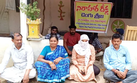 Wife Hunger Strike in Front of Husband House