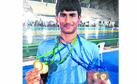 Gautham wins four medals in swimming championship
