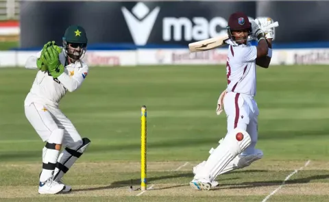 Hodge drives West Indies forward on rain affected opening day