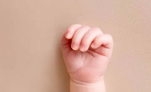 58 day old baby was thrown from a two story building