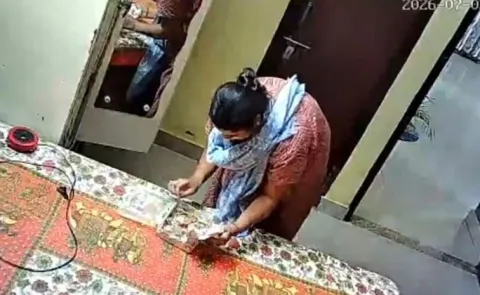 CCTV Exposes Theft Twist: Woman's Shocking Threat Stuns Owner Viral