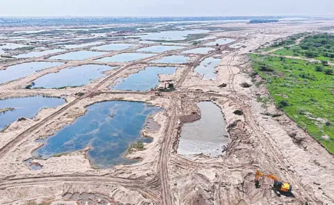 Sand mining indiscriminately in the Krishna riverbed