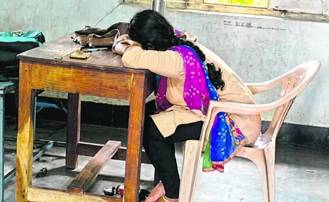 Principal sleeping in the classroom