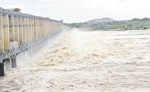 jurala project crest gates lifted with floods increased: telangana