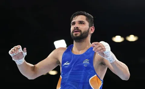 Sachin Siwach clinches the Gold Medal Mens 60kg Boxing event at Glasgow