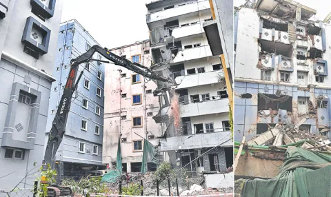 Bahubali JCB tears down Anjaiah Nagar illegal structure