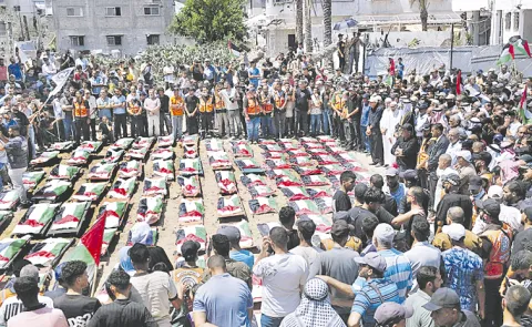Gaza holds mass funeral for 112 victims recovered after three years13