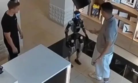 Russian Humanoid Robot Tries to Kick Man After Being Pushed Video Goes Viral