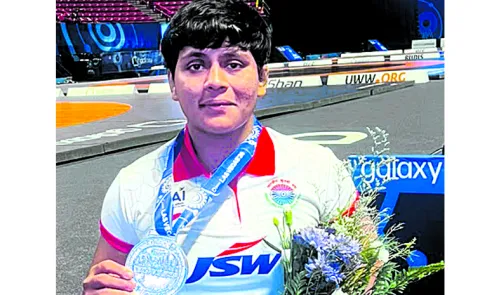 Indian wrestler Amruta Pujari won a silver medal at the wrestling championship5