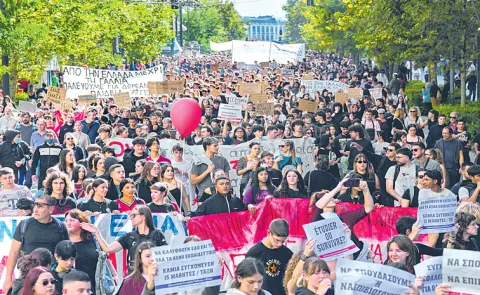 Thousands of students and teachers took to the streets across Greece9