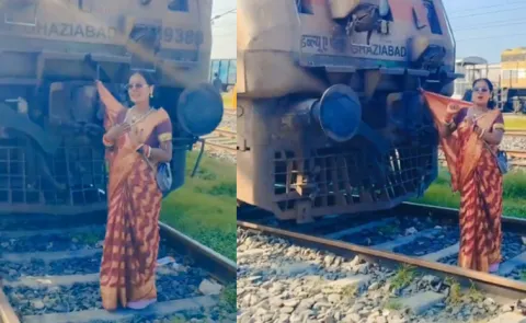 Pallu Tied To Train Woman Makes Romantic Reel On Railway Tracks!