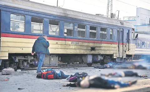 Russian drone attack on Ukrainian train station kills at least 14