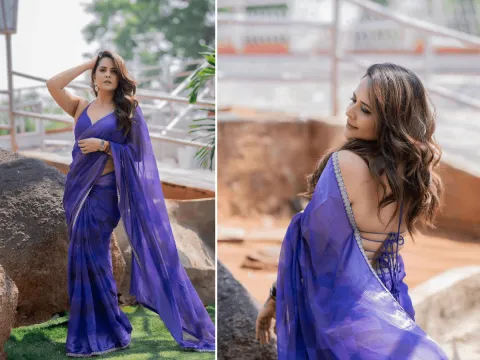 Actress Anasuya Bharadwaj Mesmerizing Photos In Blue Saree