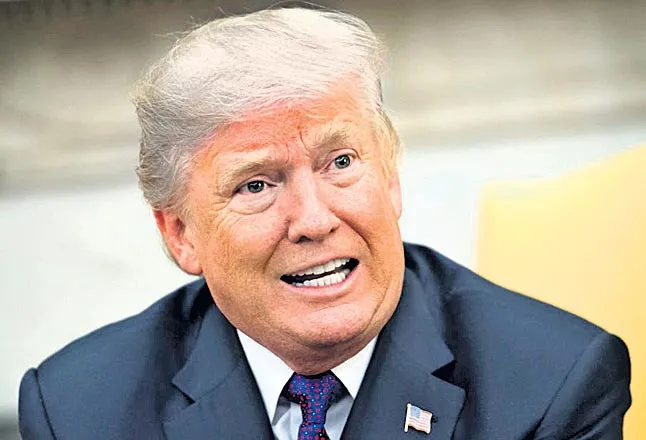 Trump Says His ‘Nuclear Button’ Is ‘Much Bigger’ Than North Korea’s - Sakshi