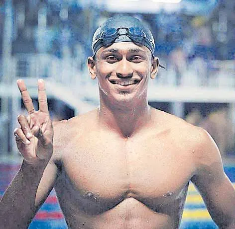 Sajan Prakash, Arvind Mani clinch seven medals for India - Sakshi