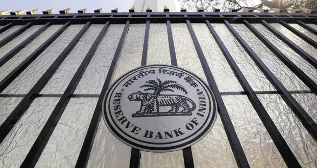 RBI defers capital buffer norms by a year, leaves Rs 37000 cr in hands - Sakshi