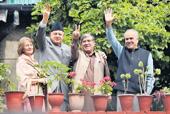 NC delegation meets Farooq, Omar Abdullah in Srinagar - Sakshi