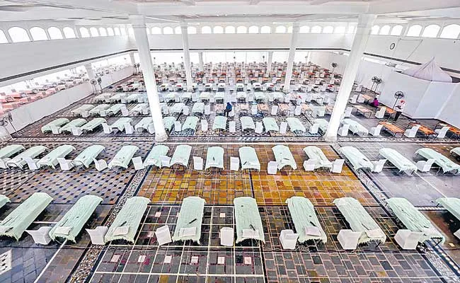 India records highest-ever 4,01,993 new cases, 3,523 deaths - Sakshi