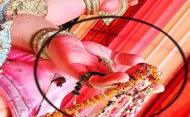 Boy Steals Ganesh Laddu In Karimnagar - Sakshi