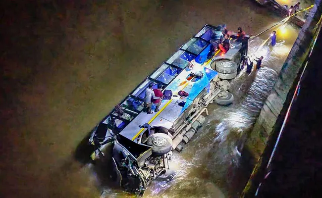 Bus Carrying 21 Passengers Falls Into River At Meghalaya - Sakshi