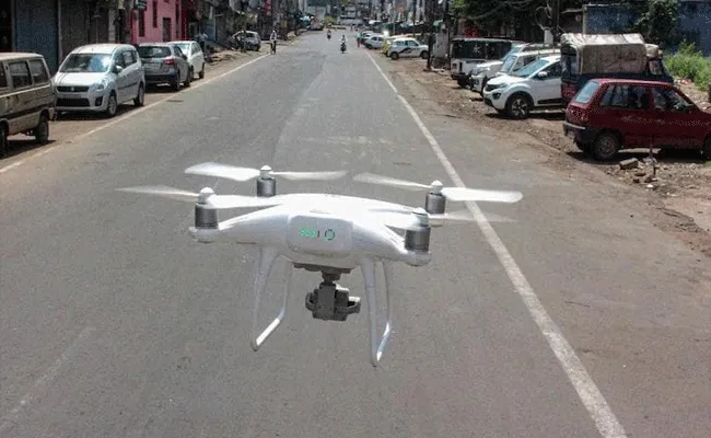 Two injured as drone falls on them during Republic Day event in Madhya Pradesh - Sakshi