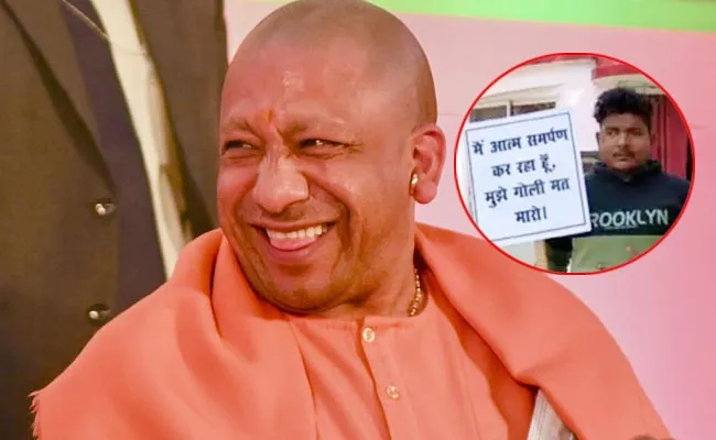 Goon surrenders with placard He Says Dont Shoot Me Uttar Pradesh - Sakshi