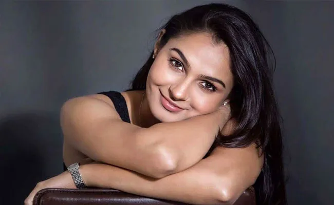 Heroine Andrea Jeremiah Receives UAE Golden Visa - Sakshi