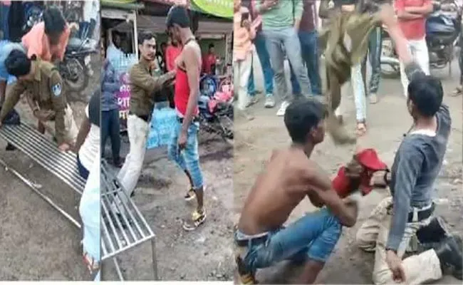 Madya Pradesh Constable Caught On Camera Throwing Uniform On Road - Sakshi