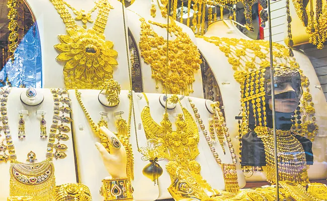 Budget 2023: Commerce Ministry seeks reduction in gold import duty to push exports - Sakshi