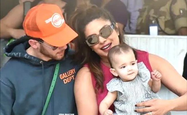 Priyanka Chopra Nick Jonas arrive to Mumbai with daughter Malti Marie  - Sakshi