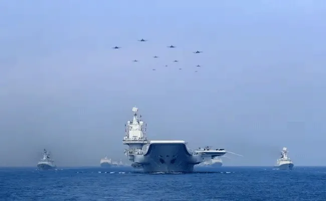 China sends warplanes, Navy ships towards Taiwan - Sakshi