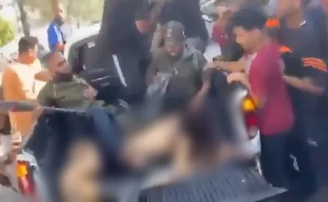 German tourist dances at festival before Hamas kidnap her - Sakshi