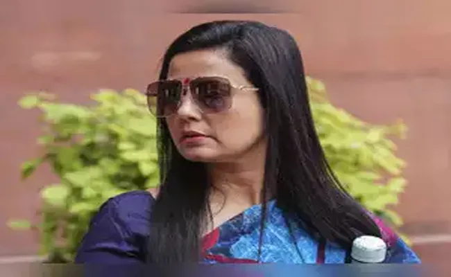 Lok Sabha Ethics panel report on Mahua Moitra submitted to Speaker Birla office - Sakshi