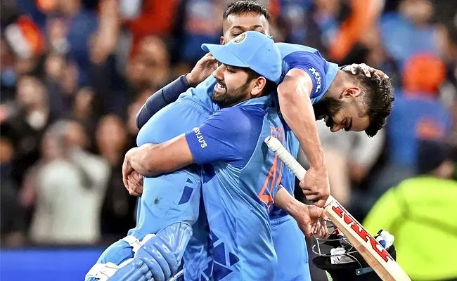He Will Definitely Play Another World Cup: Muttiah Muralitharan on Rohit Sharma - Sakshi