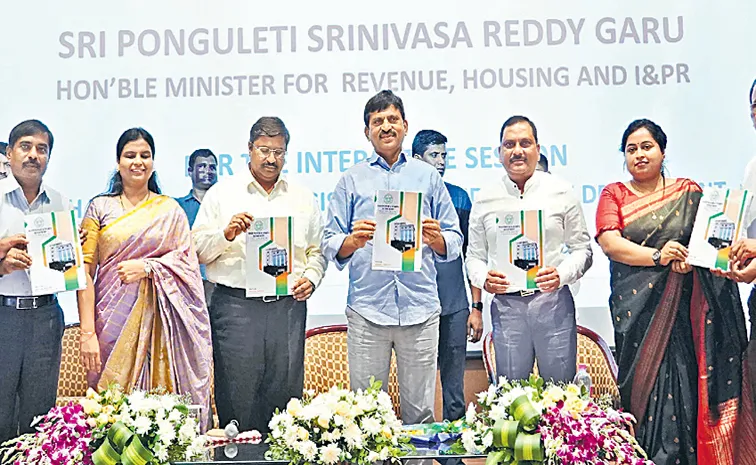 Ponguleti Srinivas with officials of the Registration Department