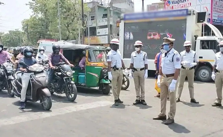 Young Man Pours petrol After Traffic Police Stops His Bike At Shamshabad