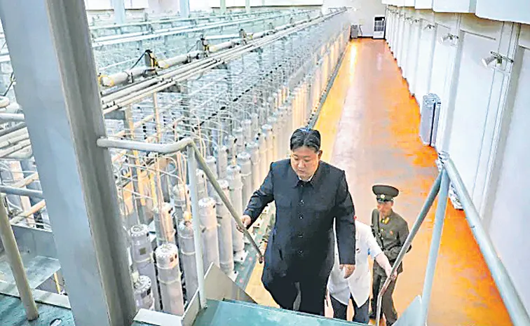 North Korea releases rare photos of Kim in nuclear facility